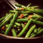 Plate of crack green beans garnished with herbs and spices