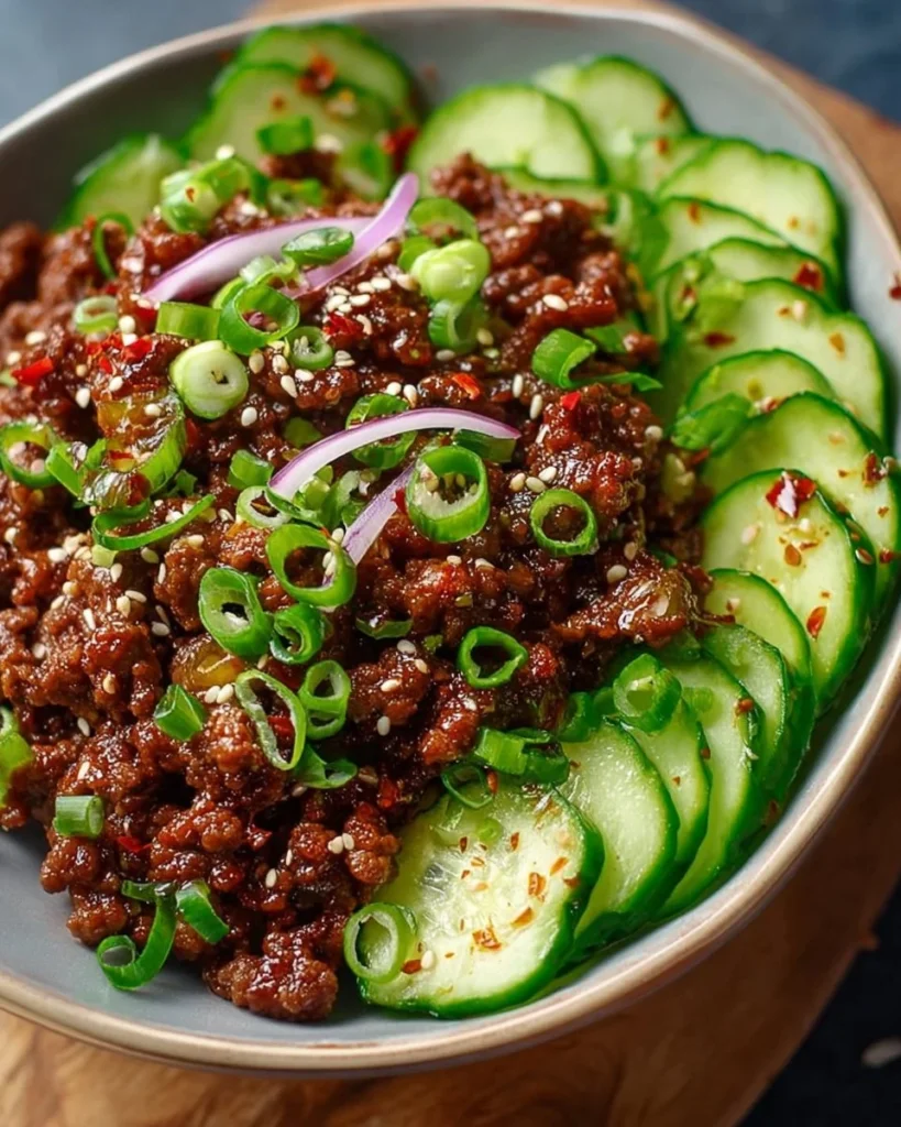Spicy Keto Korean Ground Beef served with refreshing cucumber salad